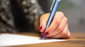 Woman's hand writing